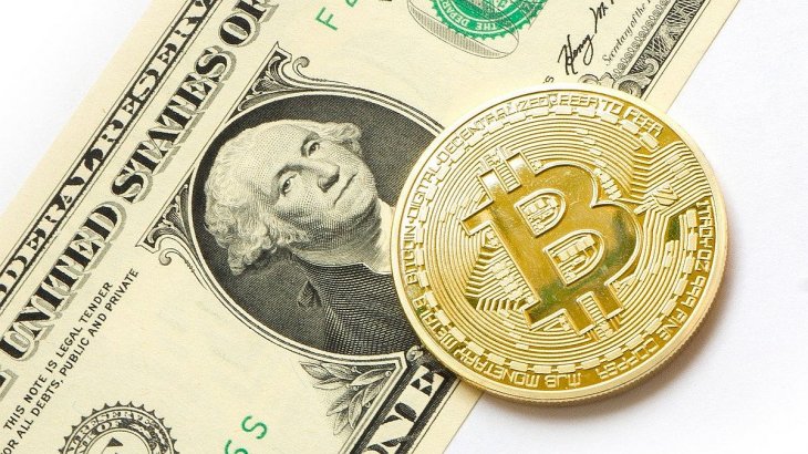 En 10 años, el dólar se devaluó casi 100% frente a Bitcoin